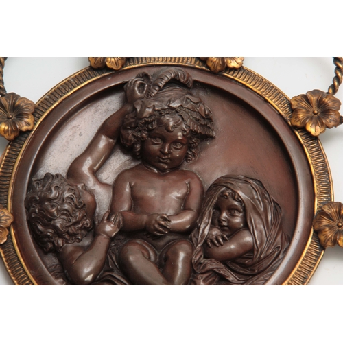 691 - EDWARD WILLIAM WYON (1811 - 1885), A PAIR OF BRONZE AND GILT BRONZE CIRCULAR PLAQUES depicting class... 