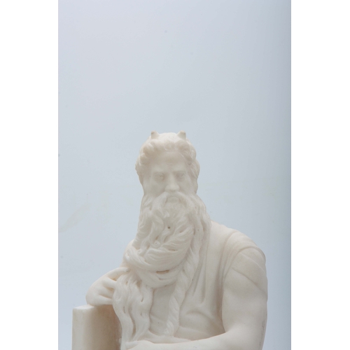 709 - AN EARLY 20TH CENTURY CARVED WHITE MARBLE SCULPTURE OF MICHAELANGELO'S MOSES - unsigned 44cm high.