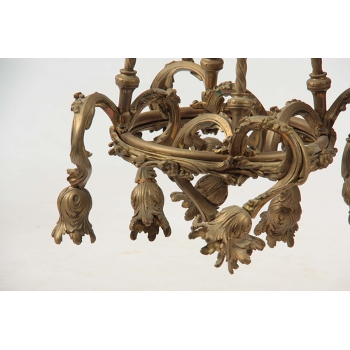 726 - AN EARLY 20th CENTURY ORMOLU AND PATINATED BRONZE CEILING LIGHT CHANDELIER with ribbon style rose ab... 