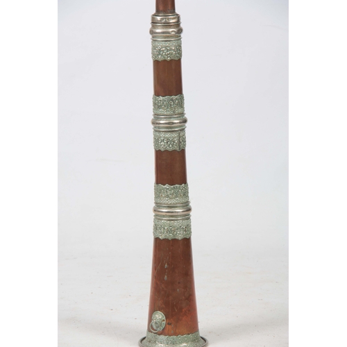 732 - A 19TH CENTURY TIBETAN BUDDHIST COPPER TELESCOPIC HORN with applied ornate embossed silvered bands 1... 