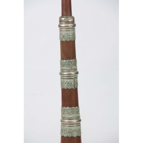 732 - A 19TH CENTURY TIBETAN BUDDHIST COPPER TELESCOPIC HORN with applied ornate embossed silvered bands 1... 