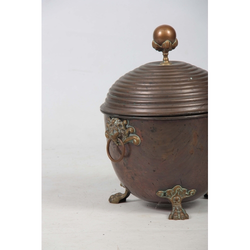 739 - A 19TH CENTURY REGENCY COPPER AND BRASS LIDDED COAL BUCKET having looped lion mask handles, lion paw... 