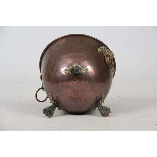 739 - A 19TH CENTURY REGENCY COPPER AND BRASS LIDDED COAL BUCKET having looped lion mask handles, lion paw... 