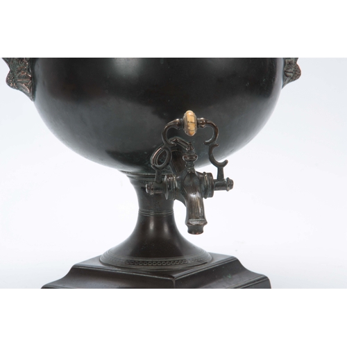 740 - A 19TH CENTURY PATINATED COPPER SAMOVAR with brass leaf cast handles and pineapple finial 39cm high.