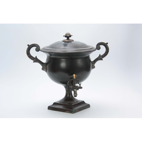 740 - A 19TH CENTURY PATINATED COPPER SAMOVAR with brass leaf cast handles and pineapple finial 39cm high.