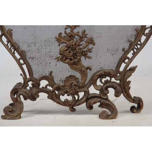 747 - A 19TH CENTURY ORMOLU FRENCH ROCOCO STYLE FIRE SCREEN having mesh steel interior - 74cm high 69cm wi... 