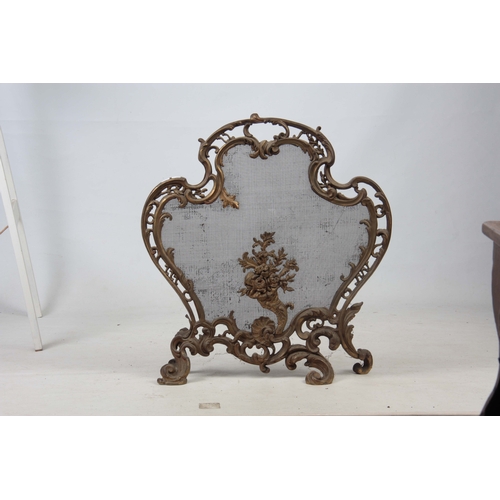 747 - A 19TH CENTURY ORMOLU FRENCH ROCOCO STYLE FIRE SCREEN having mesh steel interior - 74cm high 69cm wi... 