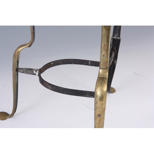 749 - A LATE GEORGIAN ENGRAVED BRASS HEARTH STAND with horseshoe-shaped cut-out top, centre bird moti... 