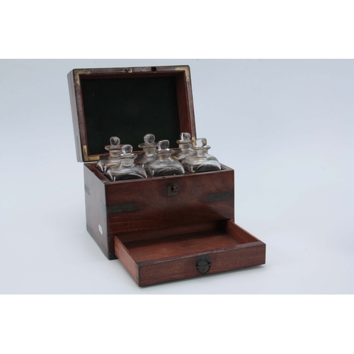 757 - AN EARLY 19th CENTURY BRASS BOUND MAHOGANY APOTHECARY BOX the locking hinged lid with sunken brass h... 