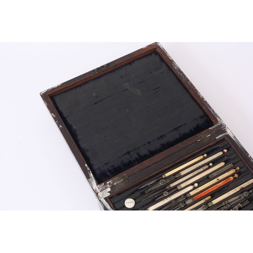 760 - A SET OF CASED 19TH CENTURY DRAFTSMAN DRAWING INSTRUMENTS with Ivory handles, rulers and various pro... 