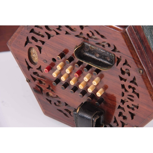 765 - A MID 19TH CENTURY WHEATSTONE CONCERTINA English system with pierced rosewood ends, green leather fi... 