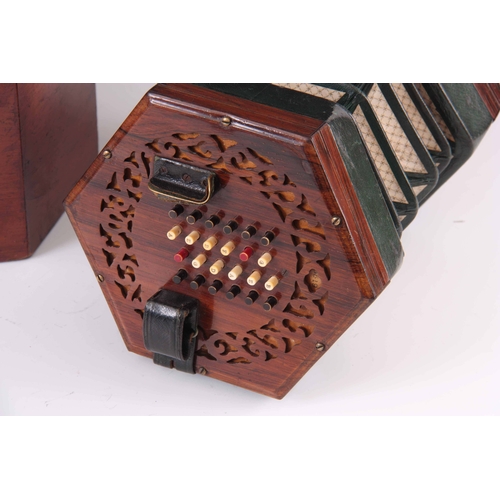 765 - A MID 19TH CENTURY WHEATSTONE CONCERTINA English system with pierced rosewood ends, green leather fi... 