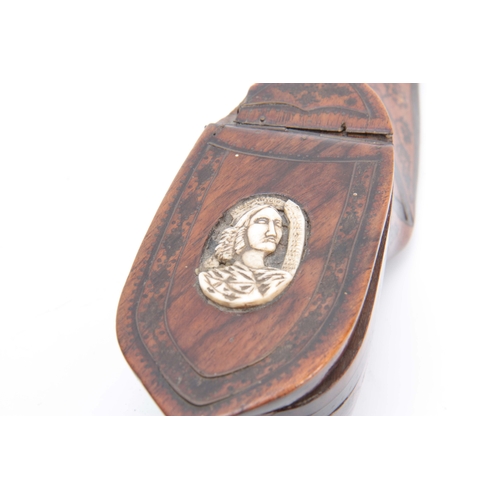 865 - AN 18TH CENTURY WALNUT TABLE SNUFF BOX IN THE FORM OF A SHOE decorated in pique work and the lid set... 