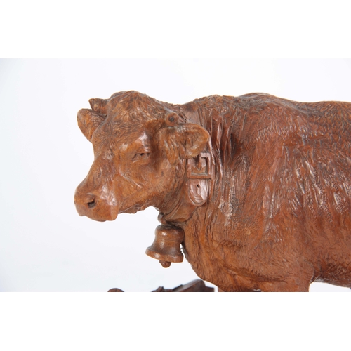 871 - A 19TH CENTURY SWISS BLACK FOREST CARVED LINDEN WOOD COW POSSIBLY BY HUGGLER finely modelled mounted... 