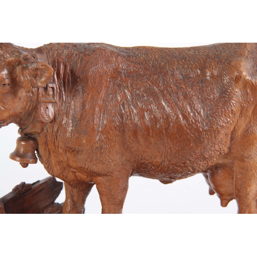 871 - A 19TH CENTURY SWISS BLACK FOREST CARVED LINDEN WOOD COW POSSIBLY BY HUGGLER finely modelled mounted... 