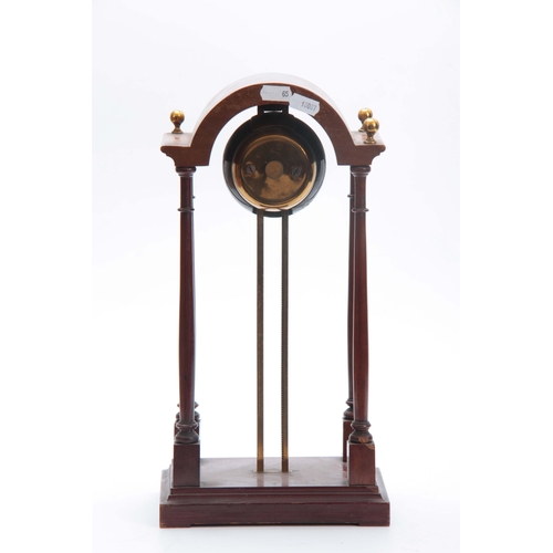 1007 - AN EARLY 20th CENTURY FRENCH GRAVITY CLOCK having a mahogany break arch top portico style case enclo... 