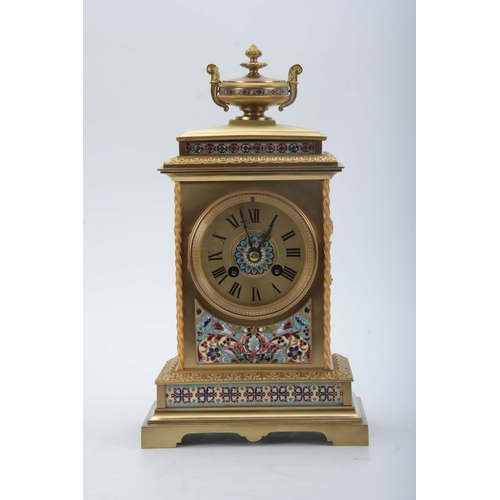 1010 - A LATE 19TH CENTURY FRENCH LACQUERED BRASS AND CHAMPLEVE ENAMEL MANTEL CLOCK with stepped leaf edged... 