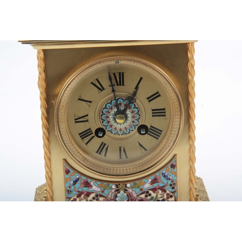 1010 - A LATE 19TH CENTURY FRENCH LACQUERED BRASS AND CHAMPLEVE ENAMEL MANTEL CLOCK with stepped leaf edged... 