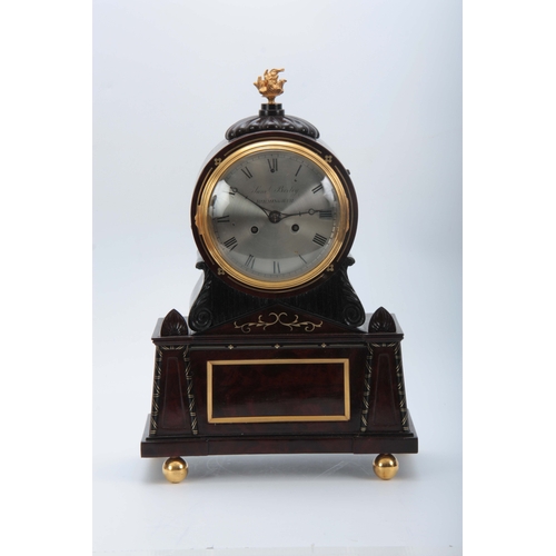 1021 - SAMUAL BIRLEY, BIRMINGHAM. A REGENCY BRASS INLAID FLAMED MAHOGANY BRACKET CLOCK with carved gadroone... 