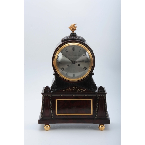 1021 - SAMUAL BIRLEY, BIRMINGHAM. A REGENCY BRASS INLAID FLAMED MAHOGANY BRACKET CLOCK with carved gadroone... 