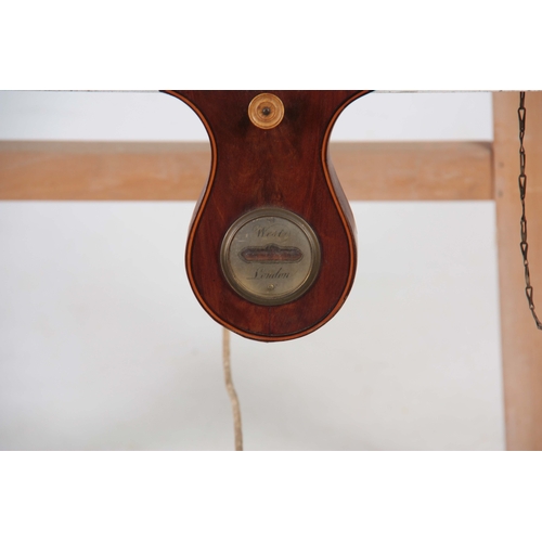 1027 - FRANCIS WEST. LONDON. A GEORGE III FIGURED MAHOGANY WHEEL BAROMETER WITH CLOCK the round top case wi... 