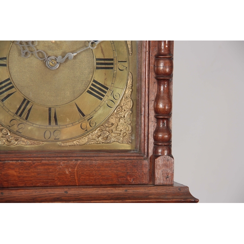 1033 - A  MID 18th CENTURY OAK CASED LONGCASE CLOCK  the hood having moulded pediment above a glazed door f... 