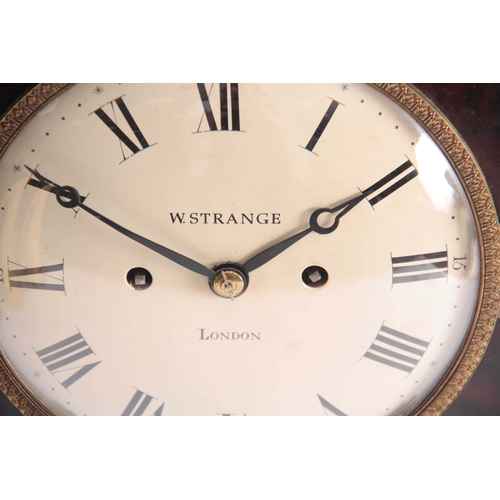 1035 - W STRANGE. LONDON A LATE REGENCY FIGURED MAHOGANY BRACKET CLOCK the gothic style case with brass mou... 