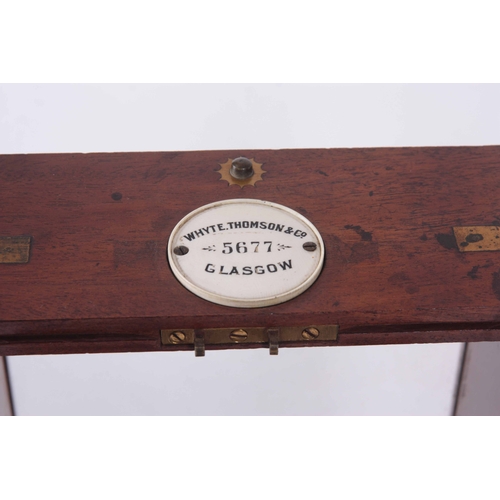 1040 - WHYTE, THOMSON & CO. GLASGOW. A LATE 19th CENTURY MARINE CHRONOMETER the brass gimbaled case enc... 