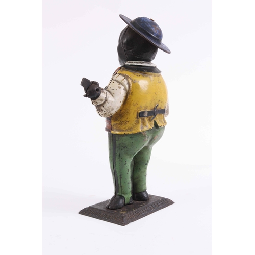 1042 - A LATE 19TH CENTURY AMERICAN PAINTED CAST IRON MANTLE CLOCK formed as a black banjo player with remo... 