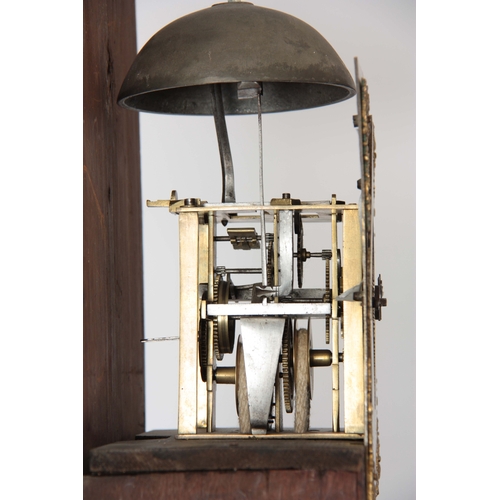 1043 - FRANCIS MITTEN, CHICHESTER. AN EARLY 18th CENTURY OAK LONGCASE CLOCK  the hood having a moulded pedi... 