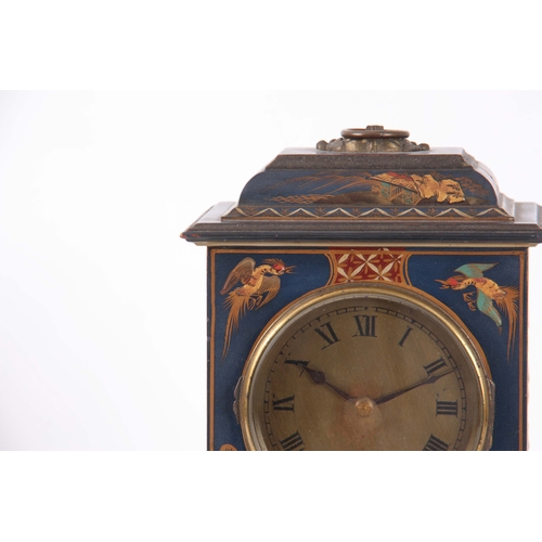 1053 - AN EARLY 20th CENTURY CHINOISERIE LACQUERED MANTEL CLOCK the case of rectangular form enclosing a 4