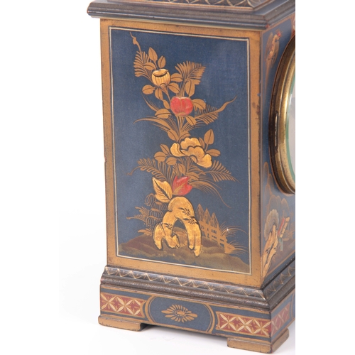 1053 - AN EARLY 20th CENTURY CHINOISERIE LACQUERED MANTEL CLOCK the case of rectangular form enclosing a 4