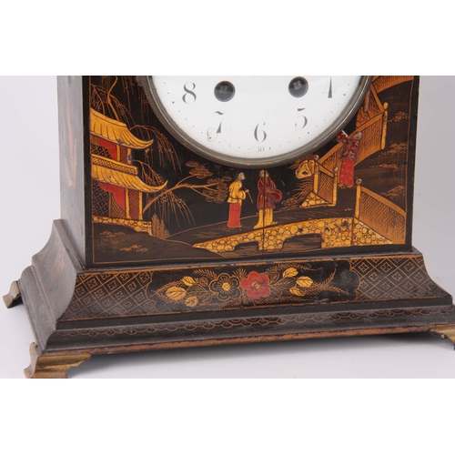 1054 - AN EARLY 20th CENTURY CHINOISERIE LACQUERED MANTEL CLOCK with pagoda-style top above a 5.5