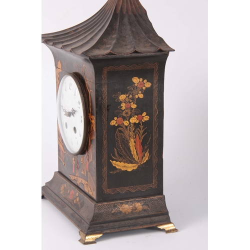 1054 - AN EARLY 20th CENTURY CHINOISERIE LACQUERED MANTEL CLOCK with pagoda-style top above a 5.5