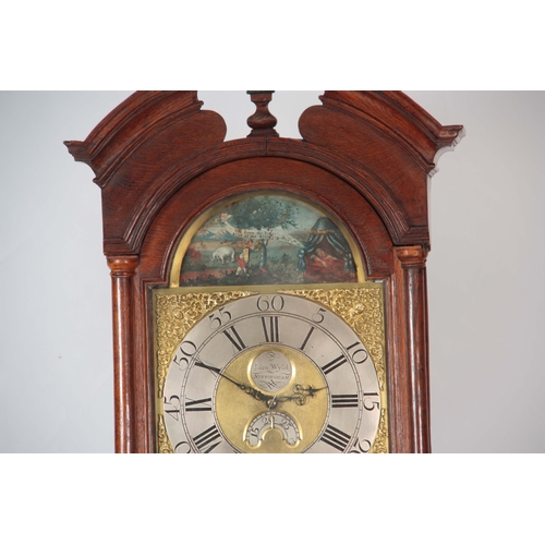 1055 - JOHN WYLDE, NOTTINGHAM. A MID 18th CENTURY AUTOMATION LONGCASE CLOCK the oak case having a break arc... 