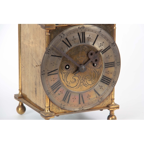 1057 - A LATE 19th CENTURY DOUBLE FUSEE LANTERN CLOCK the case surmounted by a large bell above a 7