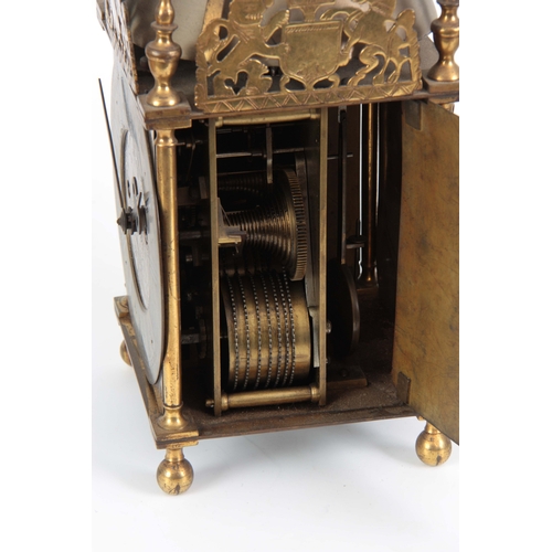 1057 - A LATE 19th CENTURY DOUBLE FUSEE LANTERN CLOCK the case surmounted by a large bell above a 7