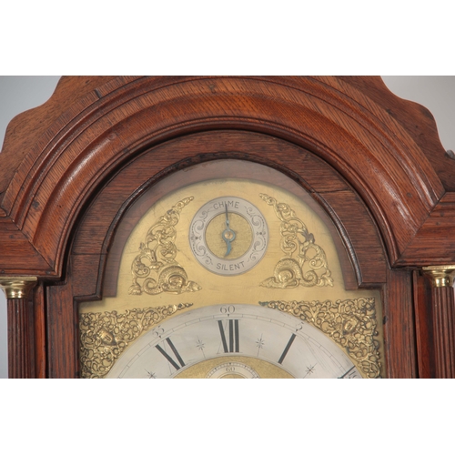 1058 - J. HARRIS, LONDON. AN 18th CENTURY OAK CASED LONGCASE CLOCK  the hood having a moulded pediment abov... 