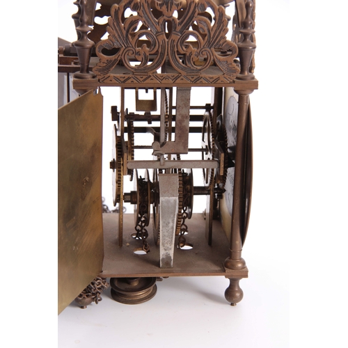 1065 - A MID 20th CENTURY LANTERN CLOCK the brass case of typical design having a 6.5