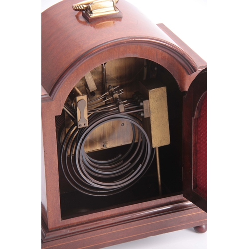 1068 - AN EDWARDIAN MAHOGANY DOUBLE FUSEE QUARTER CHIMING BRACKET CLOCK the break arched case with boxwood ... 