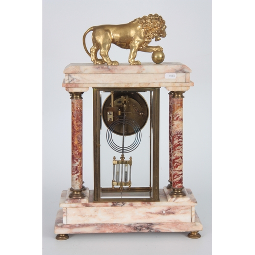 1072 - AN EARLY 20th CENTURY FRENCH MARBLE AND ORMOLU FOUR-GLASS MANTEL CLOCK the case surmounted by a gilt... 