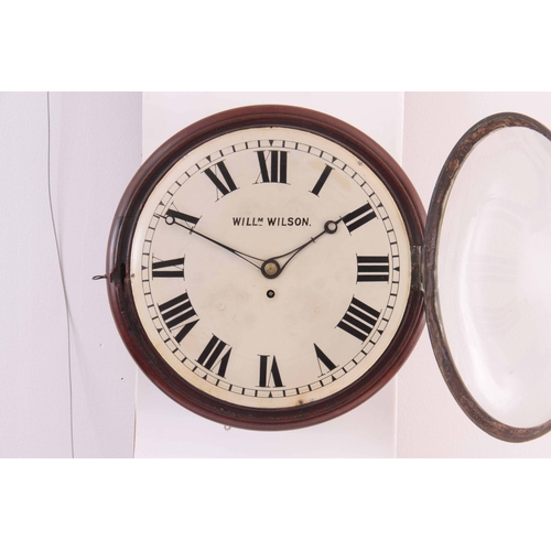 1075 - WILLIAM WILSON. A LATE REGENCY CONVEX DIAL WALL CLOCK having a moulded mahogany surround and cast br... 