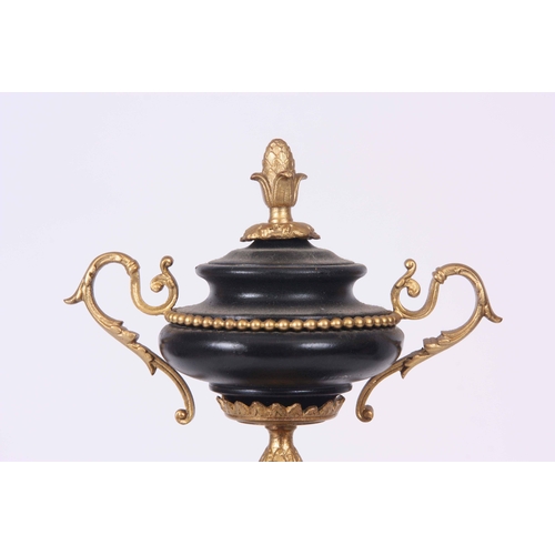 1085 - A LATE 19th CENTURY FRENCH GILT MANTLE CLOCK with urn finial and porcelain panel to the front depict... 