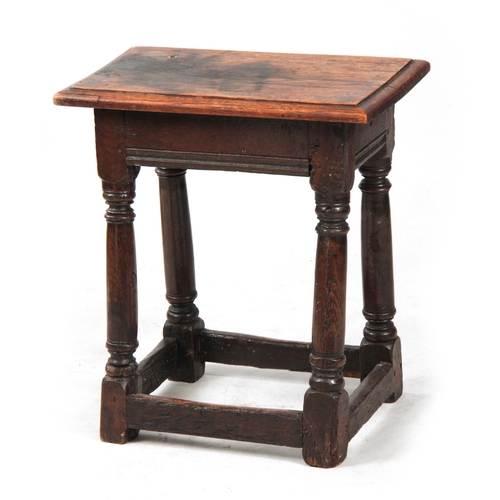 1206 - A LATE 17TH / EARLY 18TH CENTURY OAK JOINT STOOL the later moulded edge top on a dowelled ring turne... 