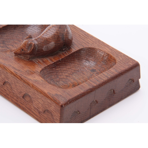 880 - AN EARLY ROBERT MOUSEMAN THOMPSON OAK PIN TRAY of rectangular form with arcaded moulded edge and car... 