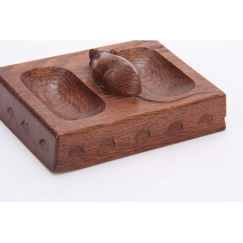 880 - AN EARLY ROBERT MOUSEMAN THOMPSON OAK PIN TRAY of rectangular form with arcaded moulded edge and car... 