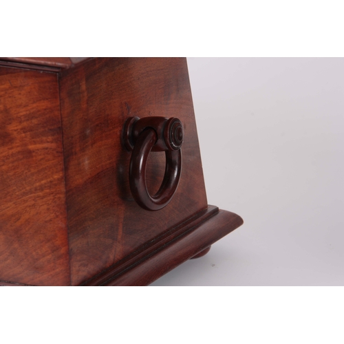 895 - A MID 19th CENTURY FIGURED MAHOGANY SARCOPHAGUS SHAPED TEA CADDY with hoop side handles and hinged l... 