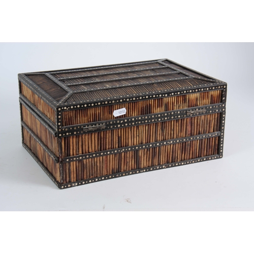 906 - A 19TH CENTURY ANGLO-INDIAN PORCUPINE QUILS BOX with panelled chamfered top having ebony and bone in... 