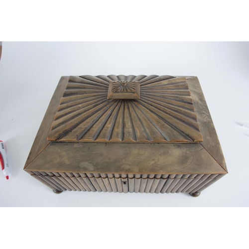 907 - A REGENCY ANGLO-INDIAN VIZAGAPATAN HORN WORKBOX having reeded veneer work, the hinged lid opening to... 