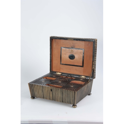 907 - A REGENCY ANGLO-INDIAN VIZAGAPATAN HORN WORKBOX having reeded veneer work, the hinged lid opening to... 